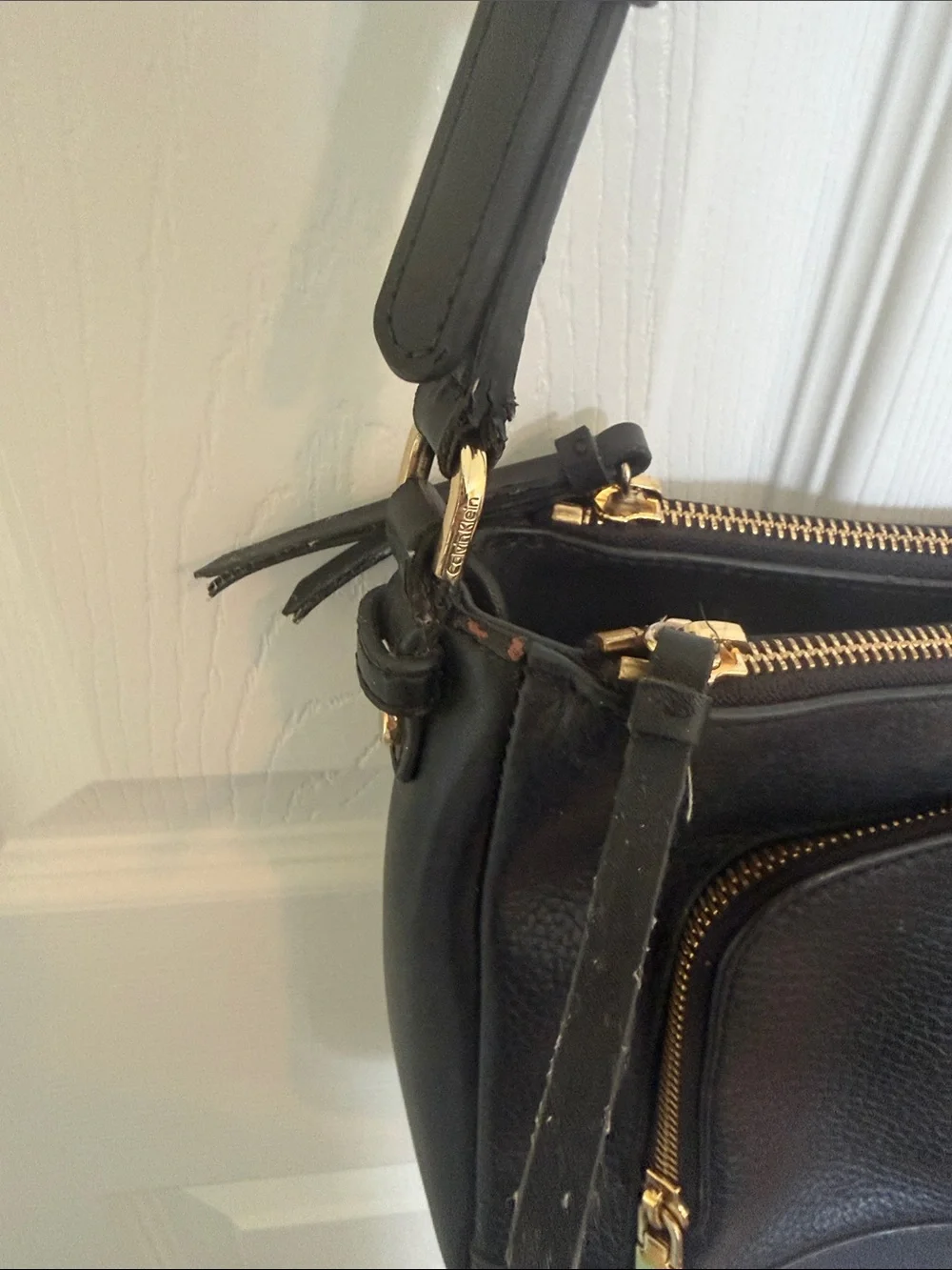 Calvin Klein Black Pebbled Leather Crossbody with Gold Accents